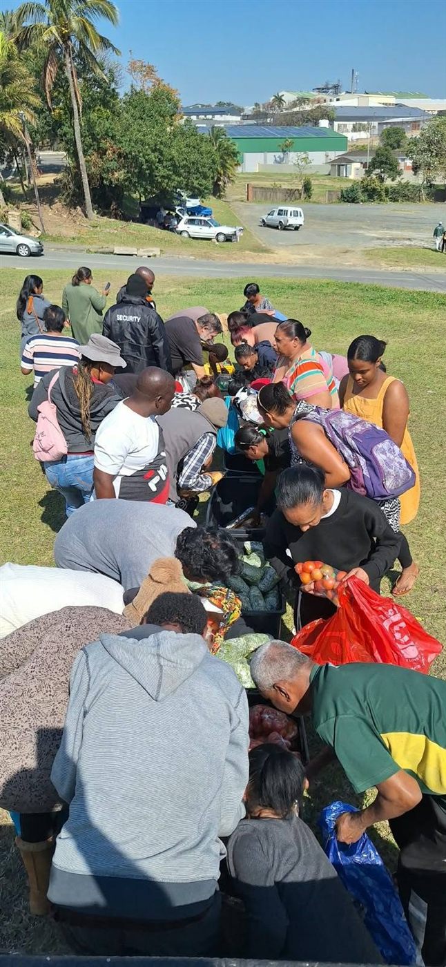 Families queueing for food