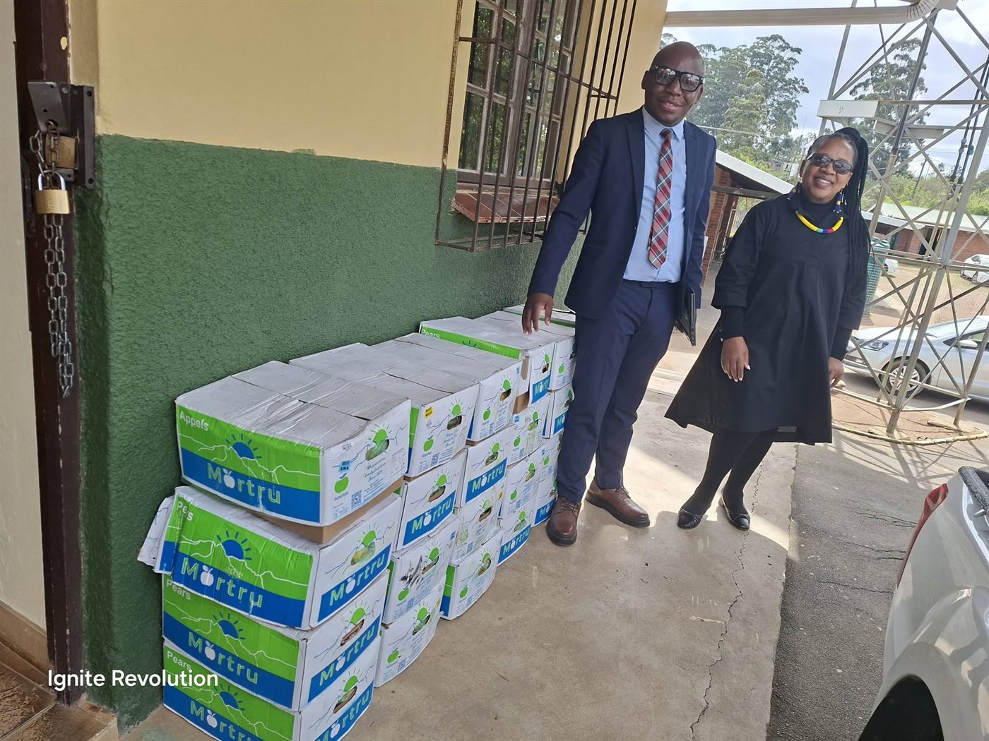 Handing over donations