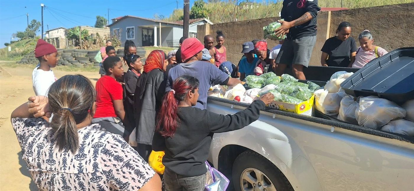 Food distribution from the back of the bakkie