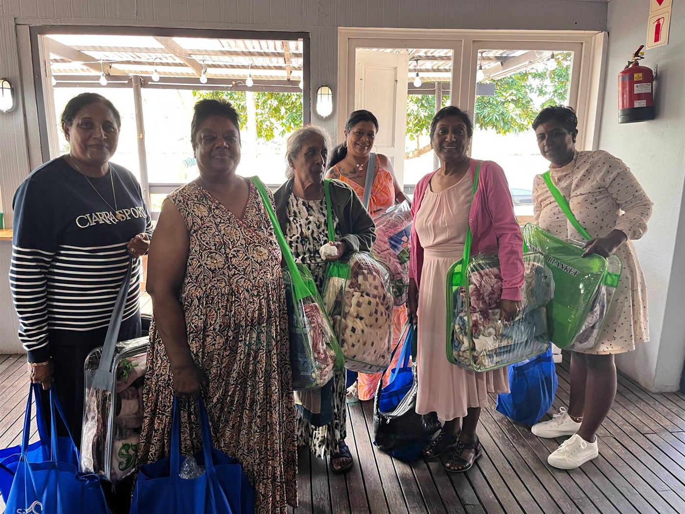 Women receiving gift packs